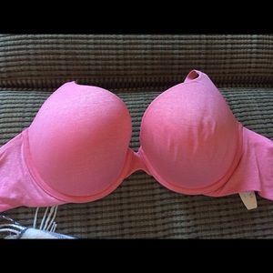 Bras, never worn. Pink and white bra with tags.